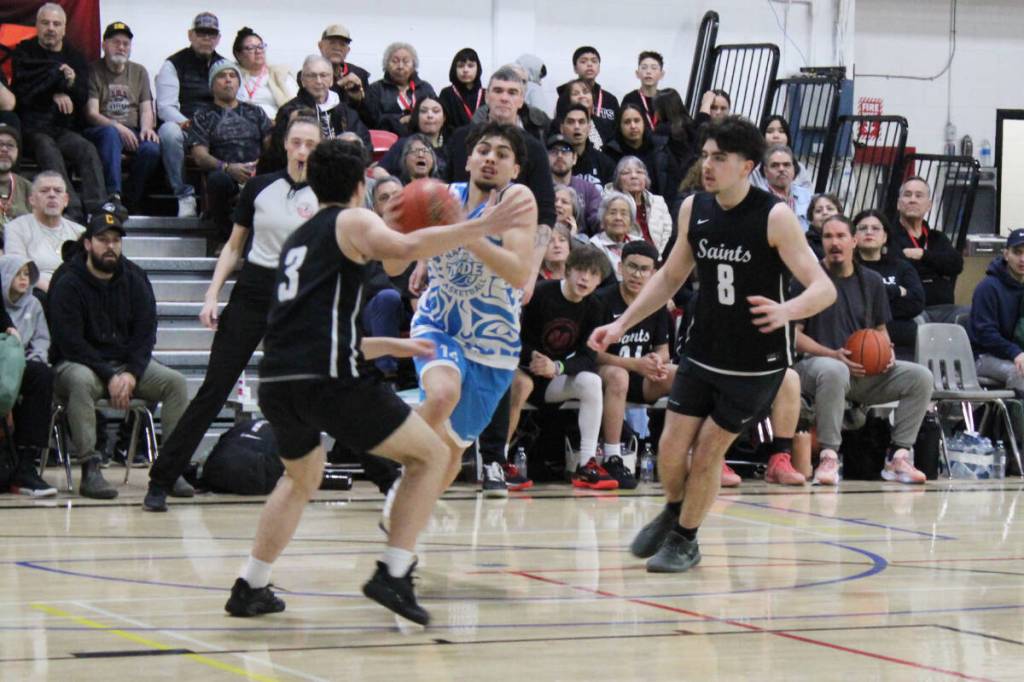 2026 All Native Basketball Tournament, Intermediate Final, Skidegate (black) versus Nanaimo, Feb. 21. (Thom Barker/Black Press Media)