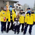 (L-R) Yellow Jackets Karen Parker, Brian Fenske, Jeff Scales and Wally Pfeifer with the Griz. Wally Pfeifer is the longest serving host with 35 years of community service (Courtesy of Bruce Elson)